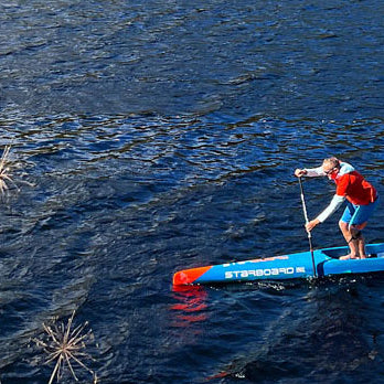 coach jonathan bischof paddle boarding in vermont fall