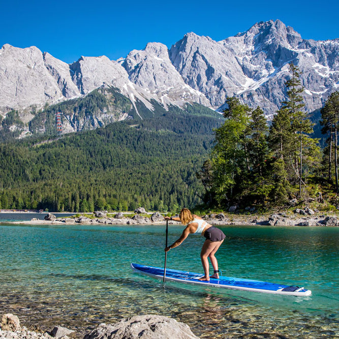 paddleboarding mountain action